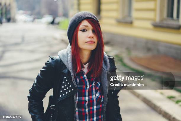 portrait of red haired teenage girl - punk stock pictures, royalty-free photos & images