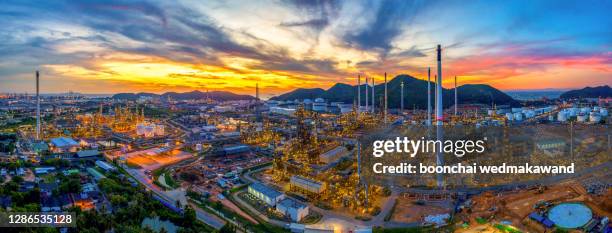 aerial view of oil and gas industry - refinery, shot from drone of oil refinery and petrochemical plant at twilight, bangkok, thailand - gas plant sunset stock pictures, royalty-free photos & images