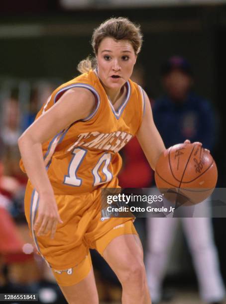 Tiffany Woosley, Guard for the University of Tennessee Lady Volunteers dribbles the basketball downcourt during the NCAA Pac-12 Conference college...