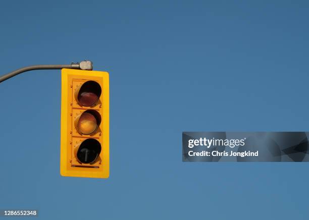 yellow traffic light - yellow light stock pictures, royalty-free photos & images