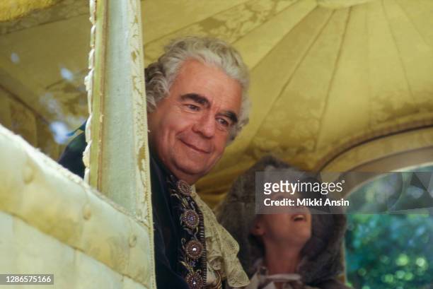 Michael Lonsdale as Louis XVI and Charlotte de Turckheim as Marie Antoinette ride in their carriage during the filming of Jefferson in Paris in...