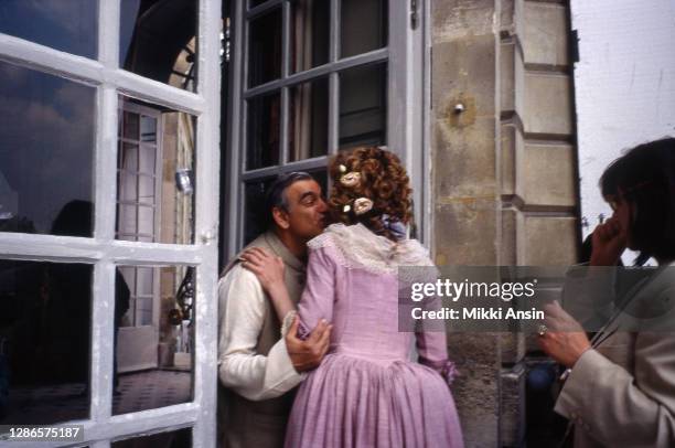 Ismaill Merchant kisses Greta Scaccihi during the filming of Jefferson in Paris in Versailles, France, in May 1994.