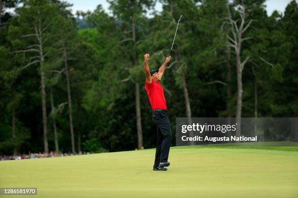 Masters champion Tiger Woods celebrates winning the Masters at Augusta National Golf Club, Sunday, April 14, 2019.