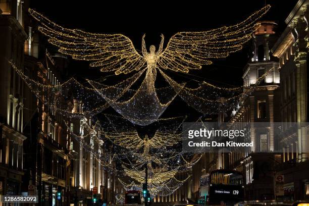 Christmas lights on Oxford Street on November 19, 2020 in London, England. The United Kingdom is currently under coronavirus lockdown restrictions,...
