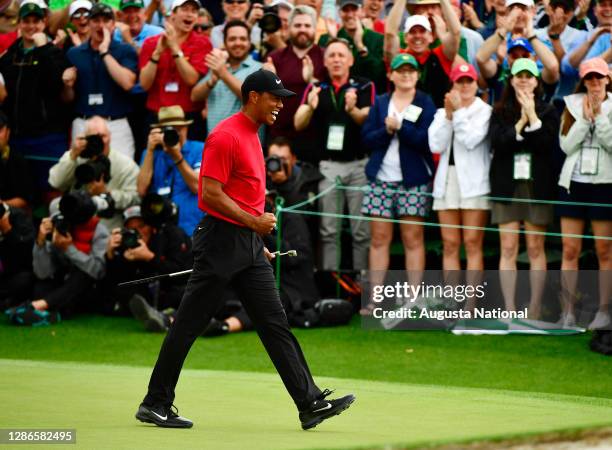 Masters champion Tiger Woods celebrates winning the Masters at Augusta National Golf Club, Sunday, April 14, 2019.