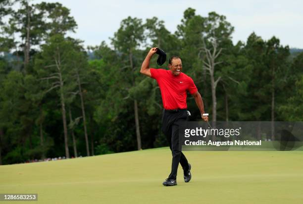 Masters champion Tiger Woods celebrates winning the Masters at Augusta National Golf Club, Sunday, April 14, 2019.