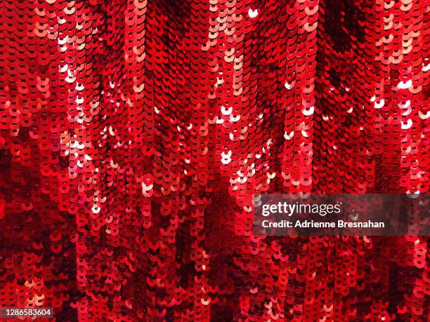 red sequins curtain - red skirt stock pictures, royalty-free photos & images