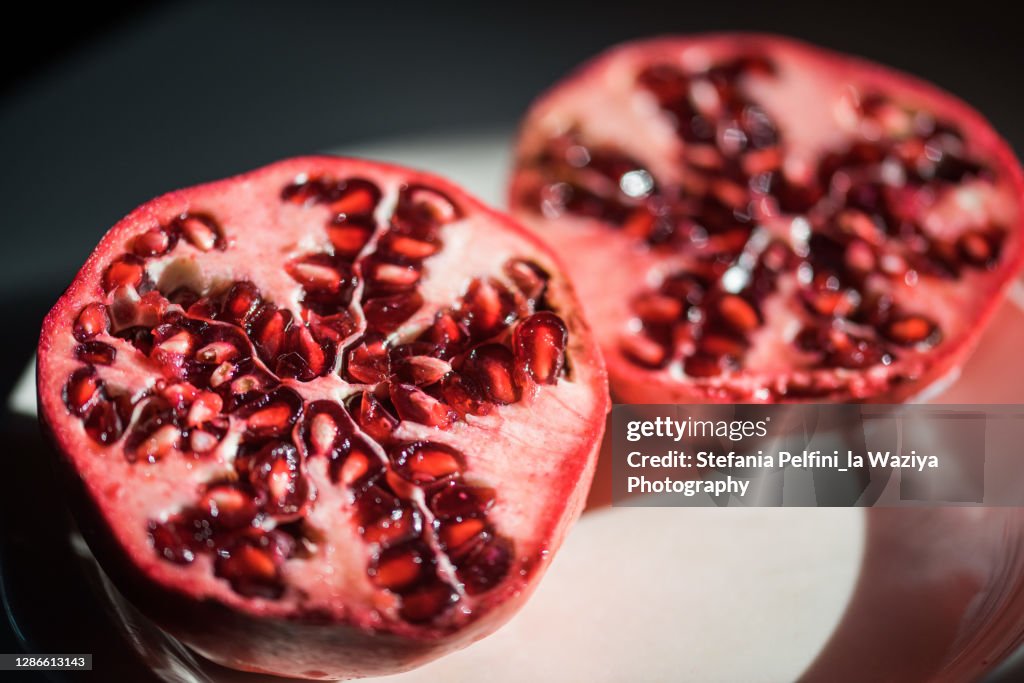 One Pomegranate Cut in Half