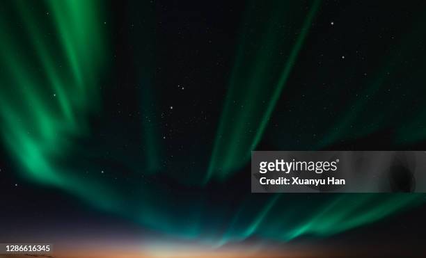 the northern lights in the night sky - aurora stock pictures, royalty-free photos & images