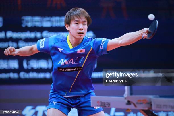 Niwa Koki of Japan competes in the Men's Singles Round of 16 match against Lin Gaoyuan of China on day two of the 2020 ITTF Finals at Zhengzhou...