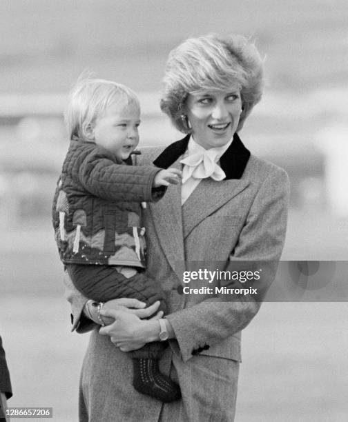 Princess Diana, The Princess of Wales, holds her son Prince William, before they board the royal plane at Aberdeen Airport, Scotland, Picture taken...