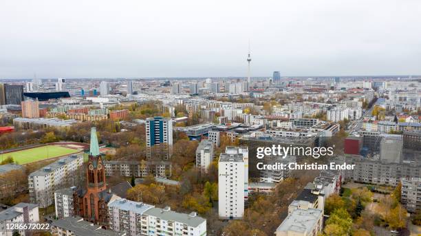 In this aerial view skyscrapers stand in the district Kreuzberg during a four-week semi-lockdown during the second wave of the coronavirus pandemic...