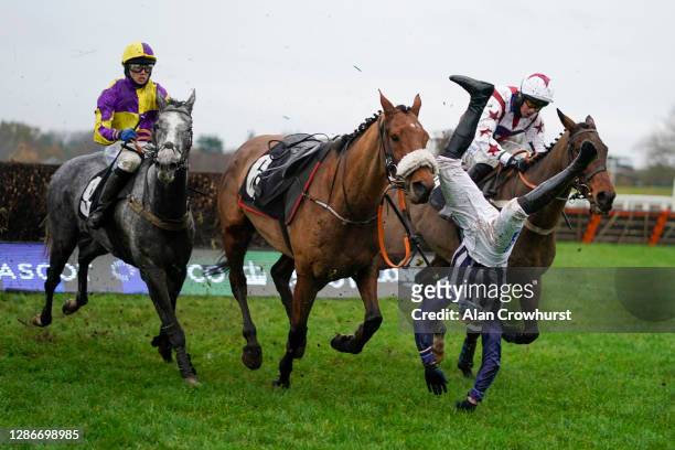 Jockey Fergus Gregory is unseated from Deauville Dancer during The Coral Handicap Chase at Ascot Racecourse on November 20, 2020 in Ascot, England....