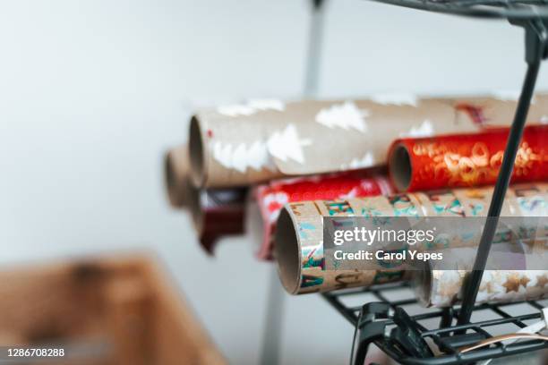 rolled christmas wrapping paper - roll of wrapping paper stock pictures, royalty-free photos & images