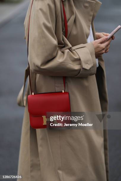 Anna Schürrle wearing red leather Hermes bag, Hugo Boss coat on November 19, 2020 in Berlin, Germany.