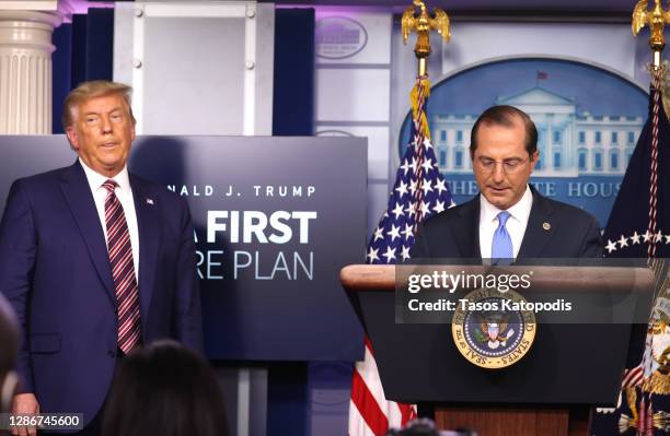 United States Secretary of Health and Human Services Alex Azar speaks to the press as U.S. President Donald Trump looks on in the James Brady Press...