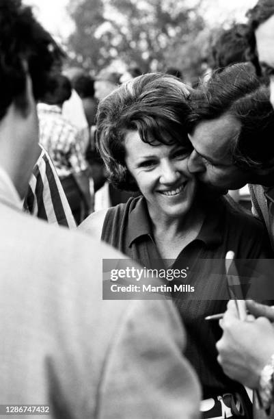 Susie Berning of the United States gets a kiss after winning the 1972 U.S. Women's Open Golf Championship on July 2, 1972 at the Winged Foot Golf...