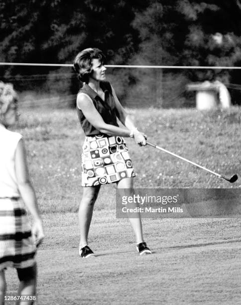 Susie Berning of the United States follows her shot during the 1972 U.S. Women's Open Golf Championship on July 2, 1972 at the Winged Foot Golf Club,...