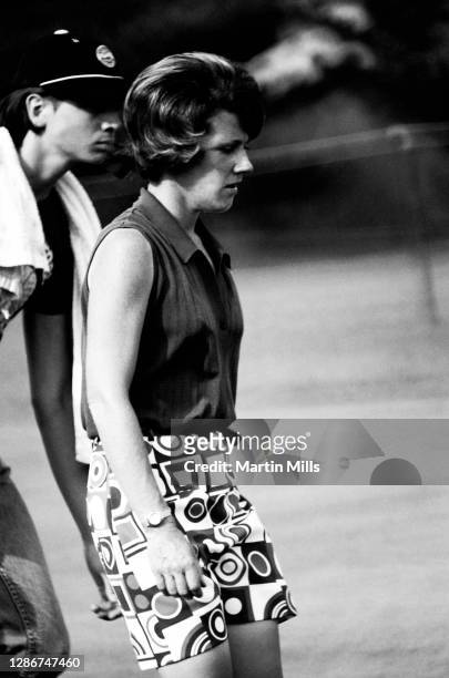 Susie Berning of the United States walks with her caddie during the 1972 U.S. Women's Open Golf Championship on July 2, 1972 at the Winged Foot Golf...