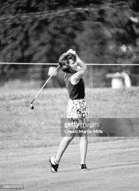 Susie Berning of the United States follows her shot during the 1972 U.S. Women's Open Golf Championship on July 2, 1972 at the Winged Foot Golf Club,...