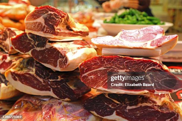 various prosciutto and serrano hams, stuttgart markthalle food market - serrano ham foto e immagini stock