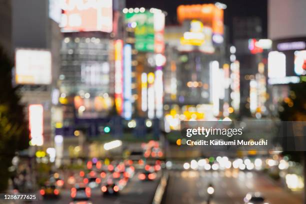 blurred abstract urban scene background - red light district stock pictures, royalty-free photos & images