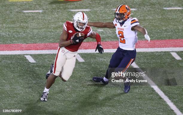 Dez Fitzpatrick of the Louisville Cardinals runs with the ball after catching a pass against the Syracuse Orange on November 20, 2020 in Louisville,...