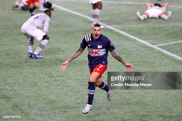 Gustavo Bou of New England Revolution celebrates after scoring the game winning goal against the Montreal Impact during second half of the Play-In...