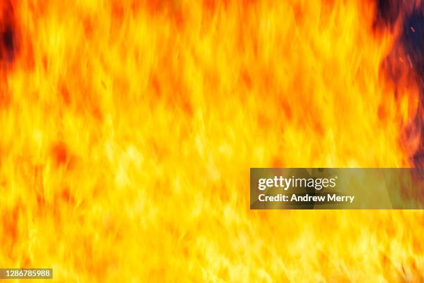 fire wall, hot, heat, yellow flames pattern, inferno - funeral program stock pictures, royalty-free photos & images