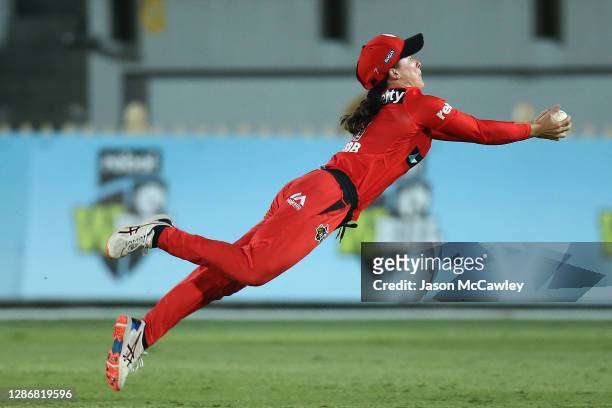 Courtney Webb of the Renegades takes a catch to dismiss Ellyse Perry of the Sixers during the Women's Big Bash League WBBL match between the Sydney...