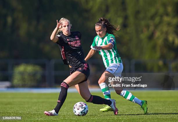 Nuria Ligero Fernandez of Real Betis competes for the ball with Sofia Jakobsson of Real Madrid during the Primera Iberdrola match between Real Betis...