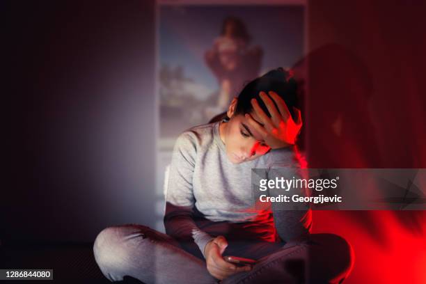 the social media overuse - depression sadness stock pictures, royalty-free photos & images