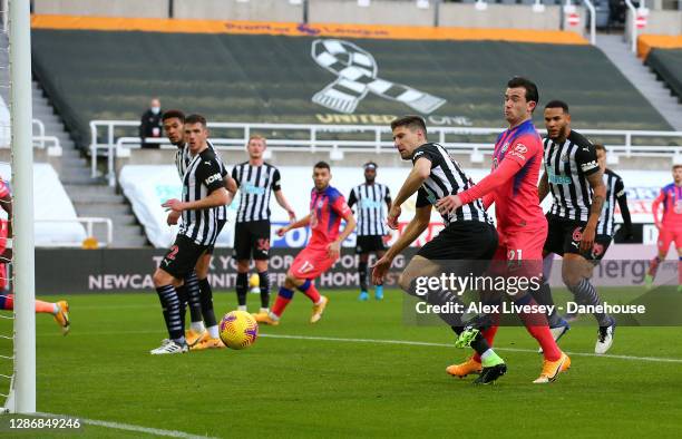 Federico Fernandez of Newcastle United scores an own goal during the Premier League match between Newcastle United and Chelsea at St. James Park on...