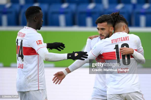 Nicolas Gonzalez of VfB Stuttgart celebrates with teammates Silas Wamangituka and Daniel Didavi after scoring his team's first goal during the...