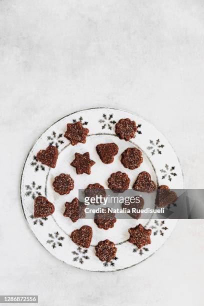 traditional christmas cookies in switzerland called in german language brunsli. - natalia star stock pictures, royalty-free photos & images