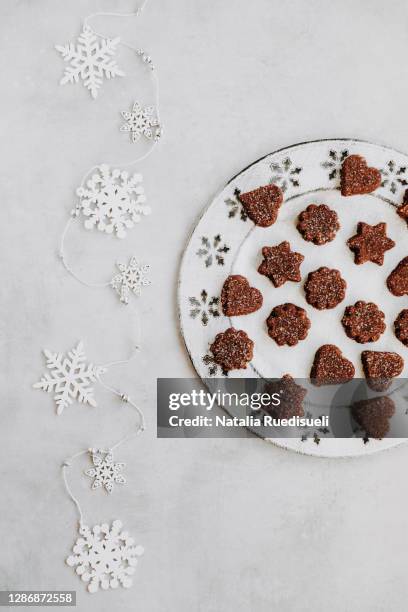 traditional christmas cookies in switzerland, called in german language basler brunsli. - natalia star stock pictures, royalty-free photos & images