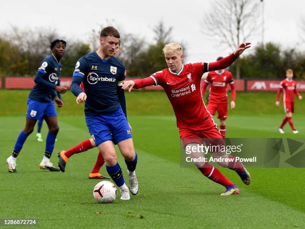Luis Longstaff of Liverpool U23 competing Southampton's captain Callum Slattery during the Premier League 2 match between Liverpool U23 and...