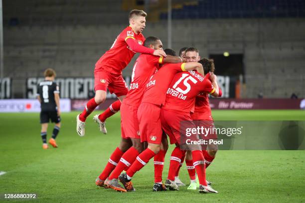 Aleksandar Dragovic of Bayer 04 Leverkusen celebrates with teammates after scoring his team's second goal during the Bundesliga match between DSC...