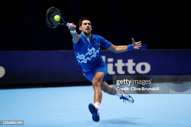 Novak Djokovic of Serbia plays a forehand during his singles semi final match against Dominic Thiem of Austria during day seven of the Nitto ATP...