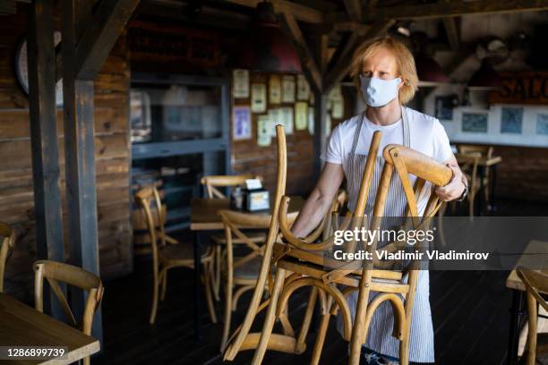 new lockdown due to covid-19 pandemic - small restaurant stock pictures, royalty-free photos & images