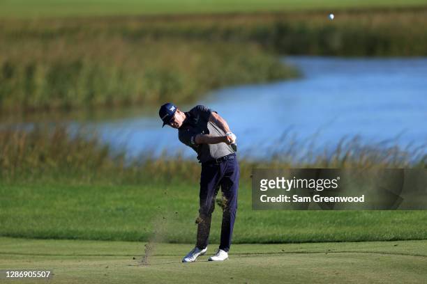 Zach Johnson of the United States plays a shot on the 13th hole during the third round of The RSM Classic at the Seaside Course at Sea Island Golf...