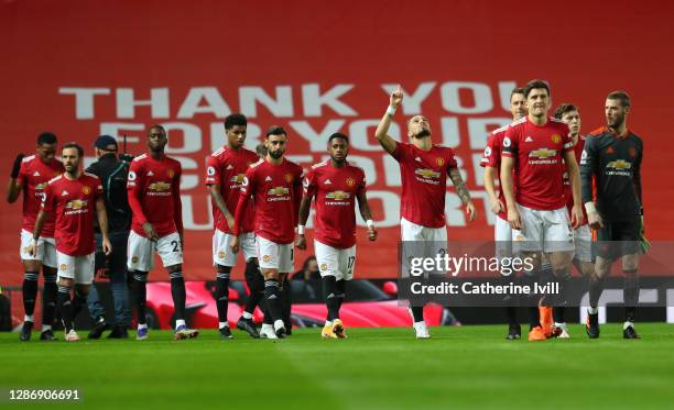 The Manchester United players walk out prior to the Premier League match between Manchester United and West Bromwich Albion at Old Trafford on...