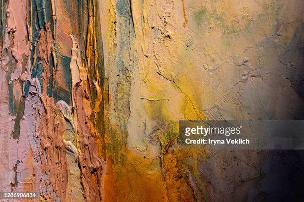 art concept with painting multicolor background. - brushed gold stockfoto's en -beelden
