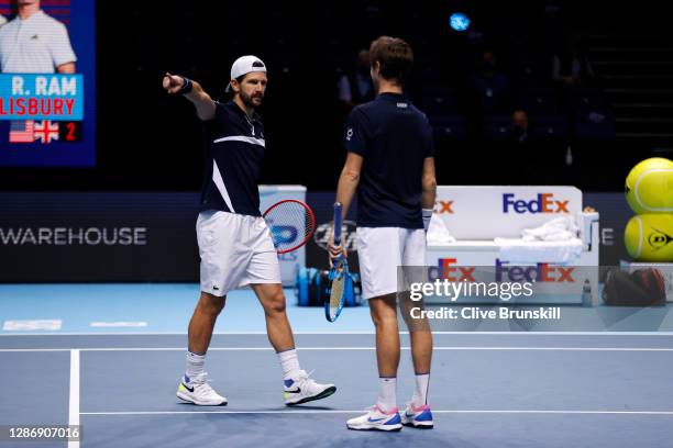 Jurgen Melzer of Austria and Edouard Roger-Vasselin of France celebrate winning match point in their doubles semi final match against Rajeev Ram of...