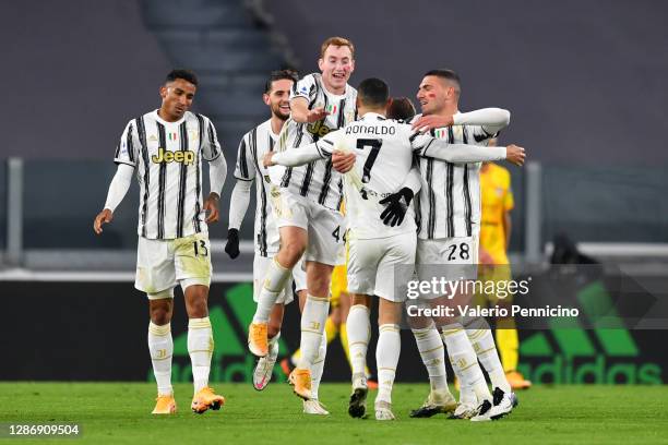 Cristiano Ronaldo of Juventus celebrates with teammates Dejan Kulusevski and Merih Demiral after scoring his team's first goal during the Serie A...