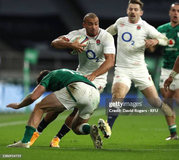 Jonathan Joseph of England is tackled by Hugo Keenan during the England v Ireland Quilter International match, part of the Autumn Nations Cup at...