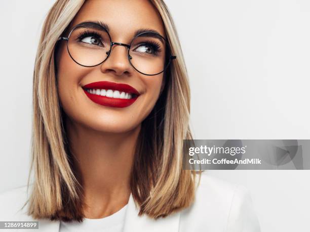 portrait of a beautiful woman - red lipstick stock pictures, royalty-free photos & images