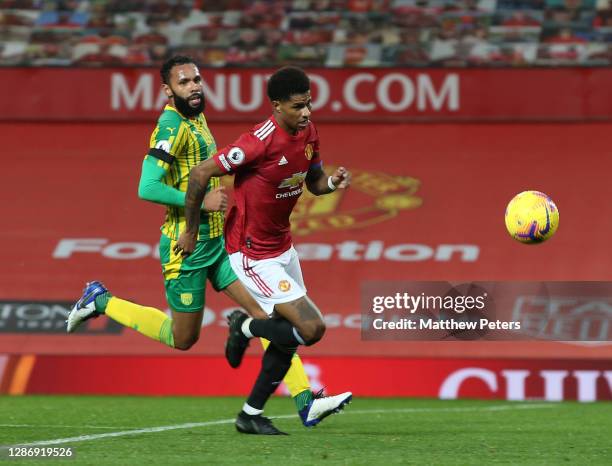 Marcus Rashford of Manchester United in action with Kyle Bartley of West Bromwich Albion during the Premier League match between Manchester United...