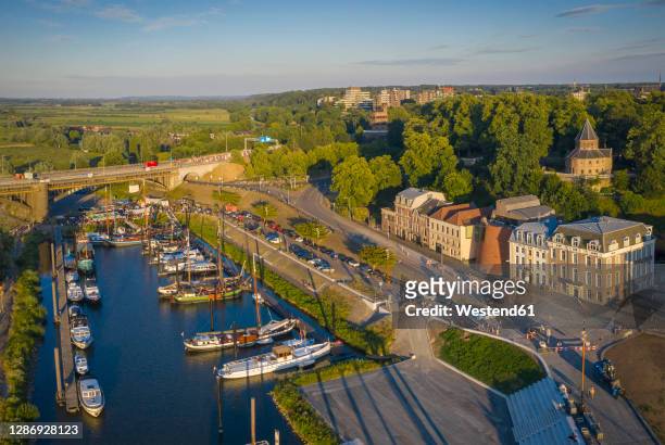 netherlands, gelderland, nijmegen, aerial view of harbor of riverside city - nimegue photos et images de collection