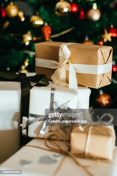 christmas tree with decorations and present - party under stock pictures, royalty-free photos & images